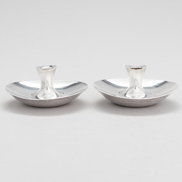 Tapio Wirkkala, Two candleholders, silver, Hopeatehdas, Helsinki 1957 and 1959.