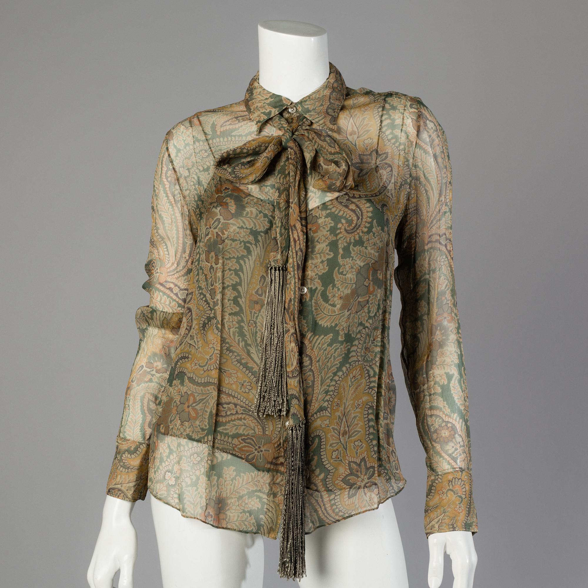 Jacket and blouse by Ralph Lauren.