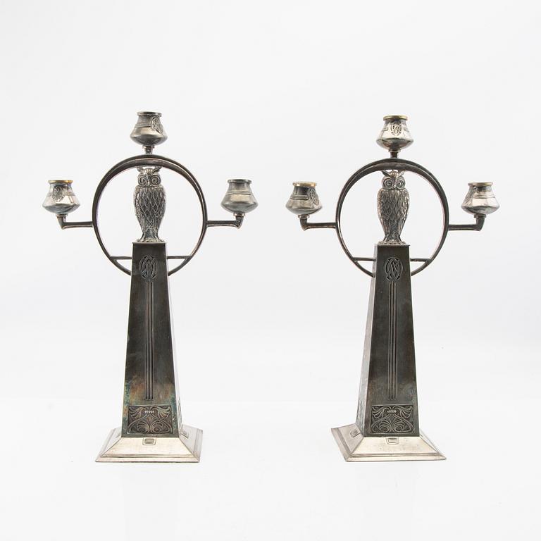 Candelabras, a pair by WMF (Württembergische Metallwarenfabrik), early 20th century, nickel silver.