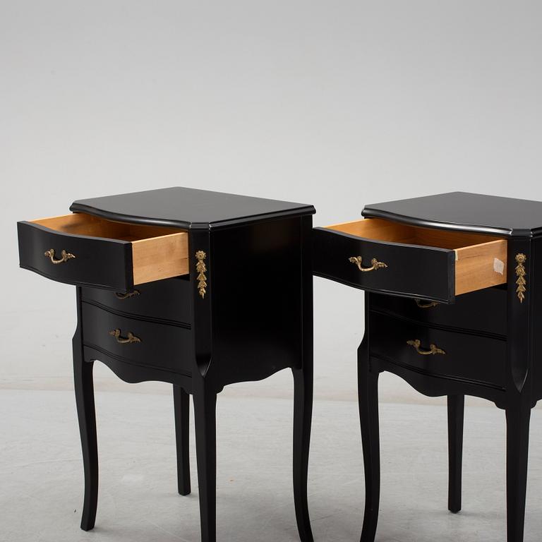 A pair of Rococo style bedside tables, second half of the 20th century.