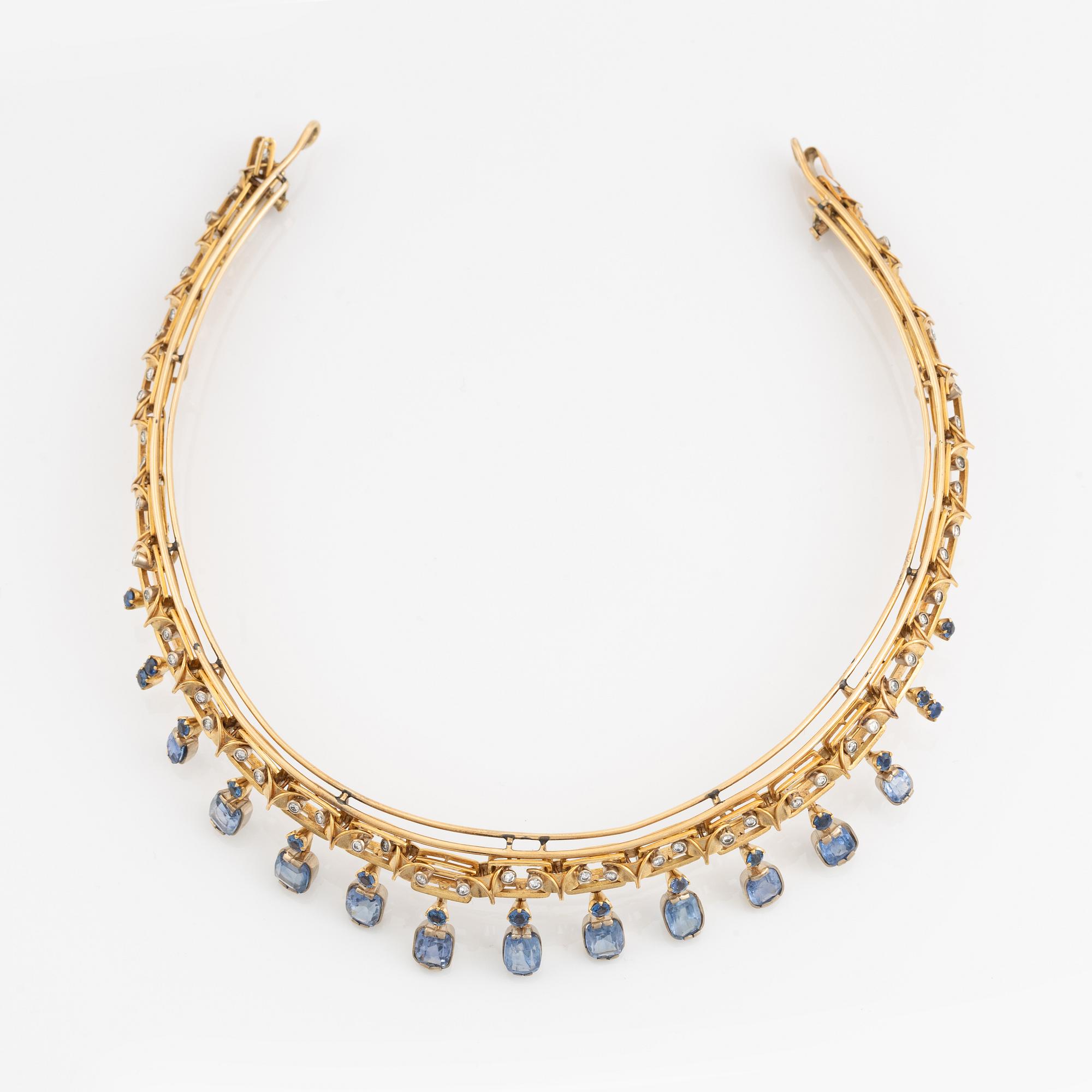 A tiara/necklace combination in 18K gold with sapphires and round brilliant-cut diamonds.