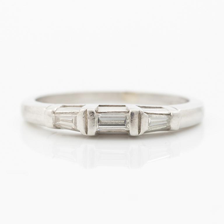 Platinum ring with baguette-cut diamonds.