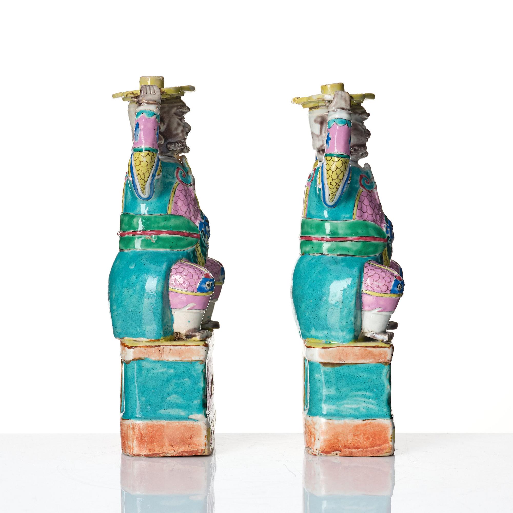 A pair of famille rose candlesticks, Qing dynasty, Qianlong (1736-95).