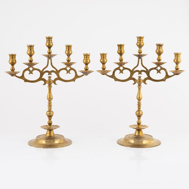 A pair of brass candelabras, early 20th century.