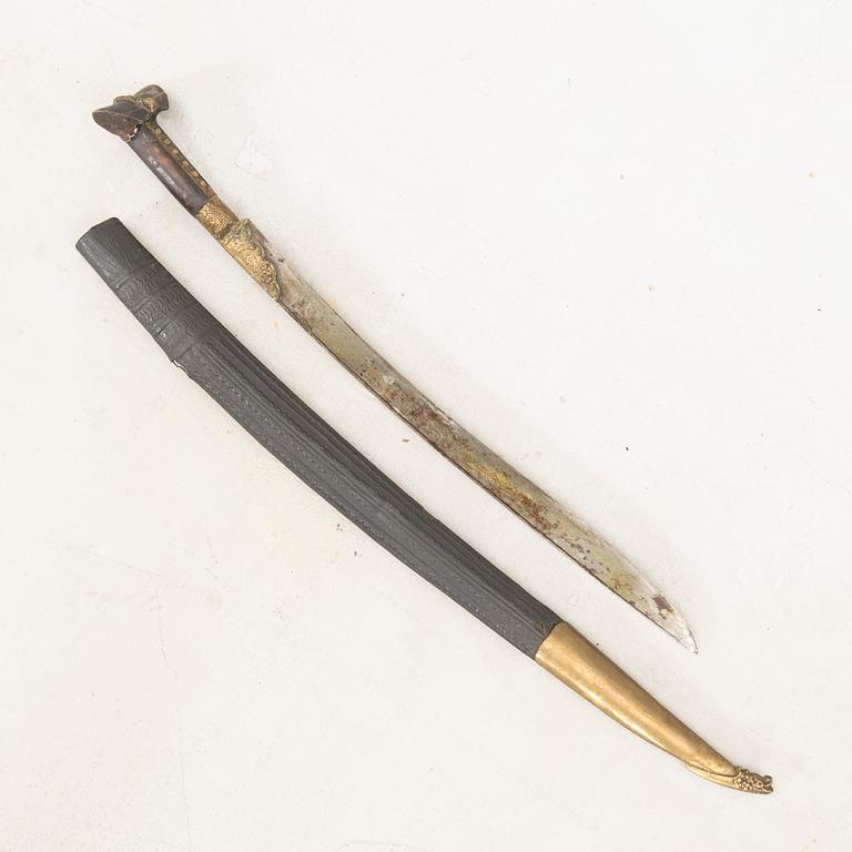 A Yataghan, 19th century, with scabbard.