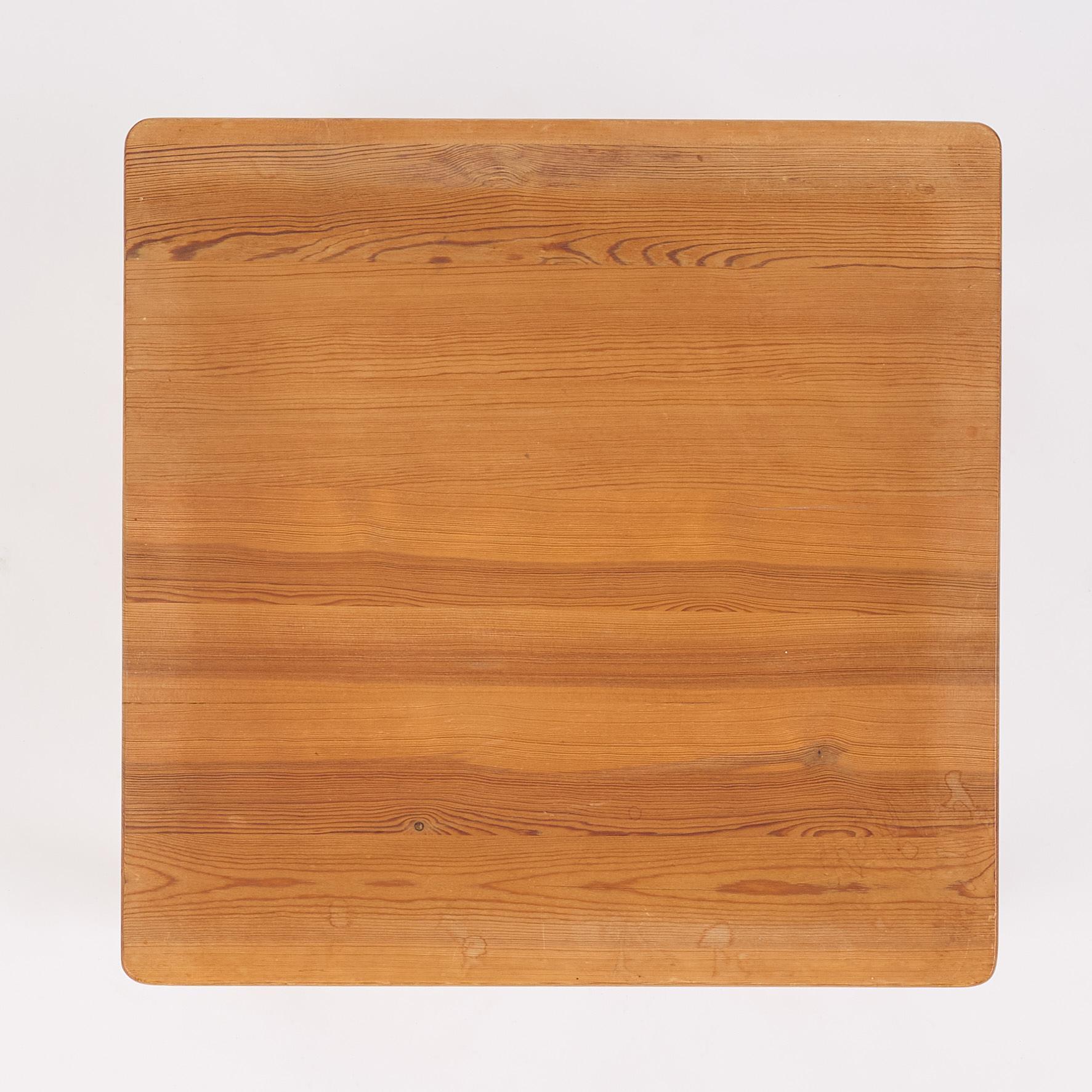 Axel Einar Hjorth, a stained pine "Värmdö" table, Nordiska Kompaniet, Sweden, 1930s.
