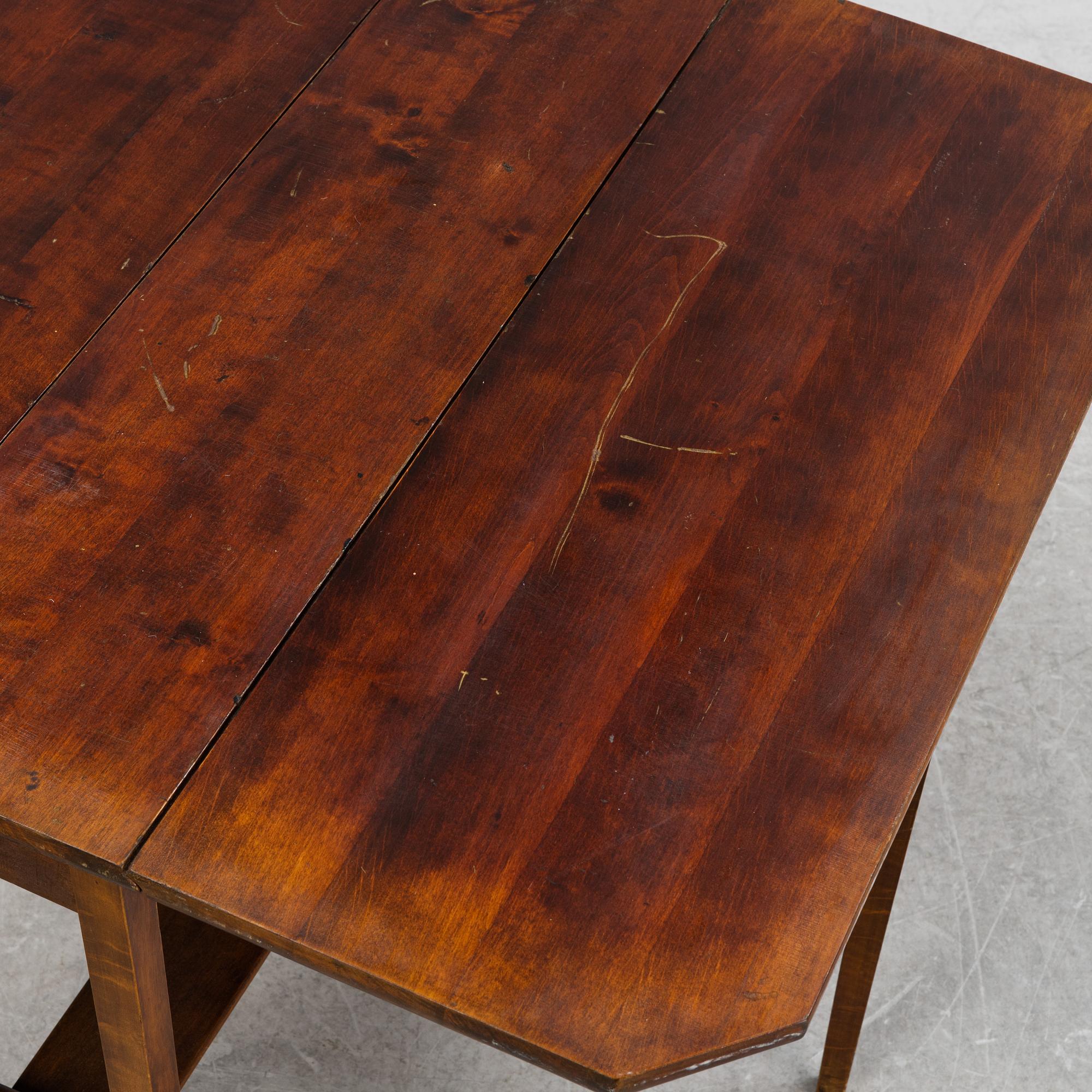 Two gate-leg tables from the first half of the 20th century.