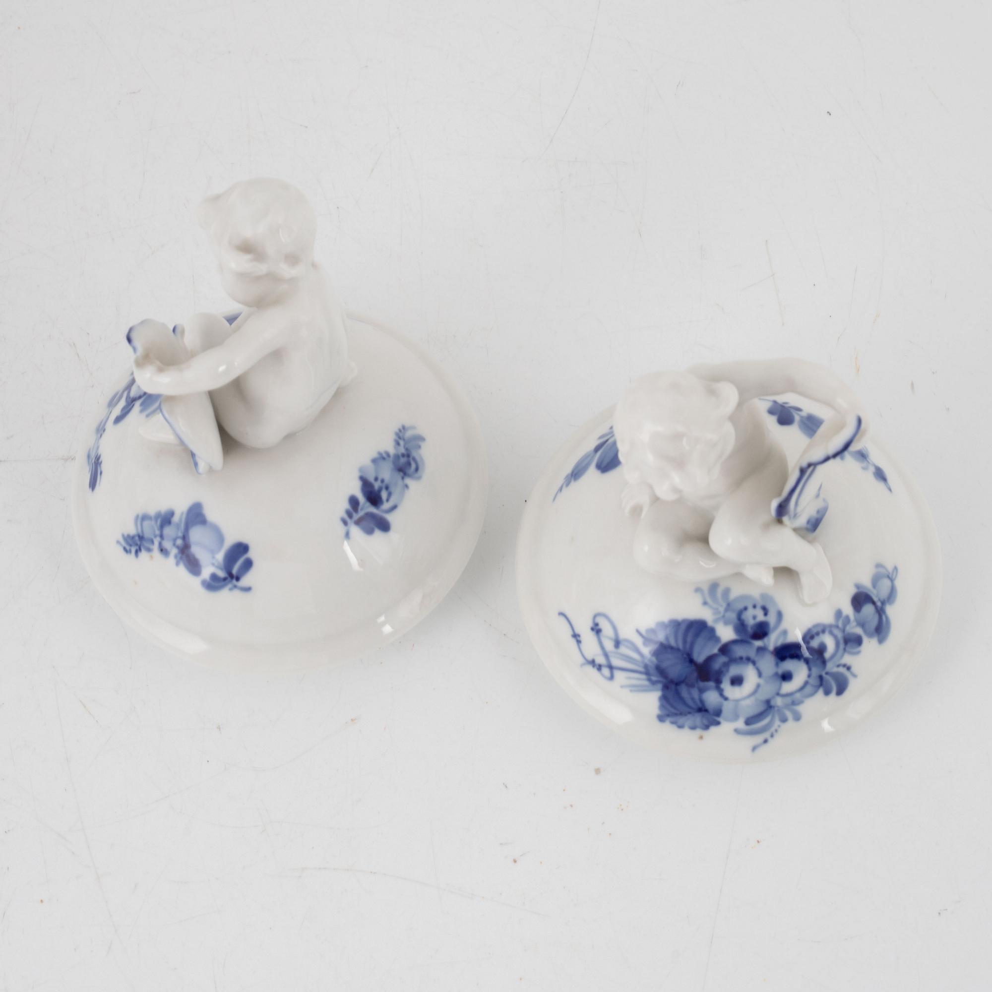 A pair of 'Blå Blomst' porcelain lidded urns, Royal Copenhagen, Denmark.
