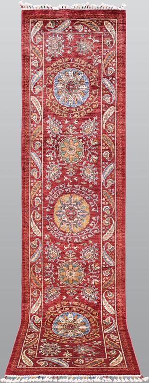 A carpet, Ziegler, c. 307 x 78 cm.