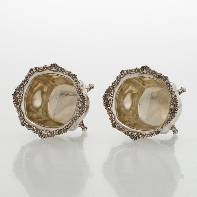 Black Starr & Frost, a pair of sterling silver shakers and sugar bowls, USA around 1900, Gorham pair of sterling spoons.