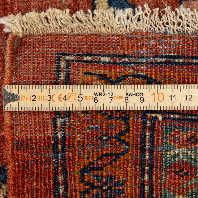 An Antique Sarouk carpet, West Persia, c. 353 x 260 cm.