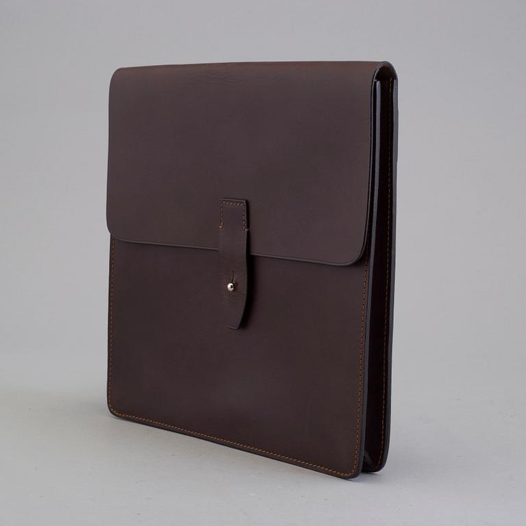 THOMAS SANDELL, a leather bag from Palmgrens.