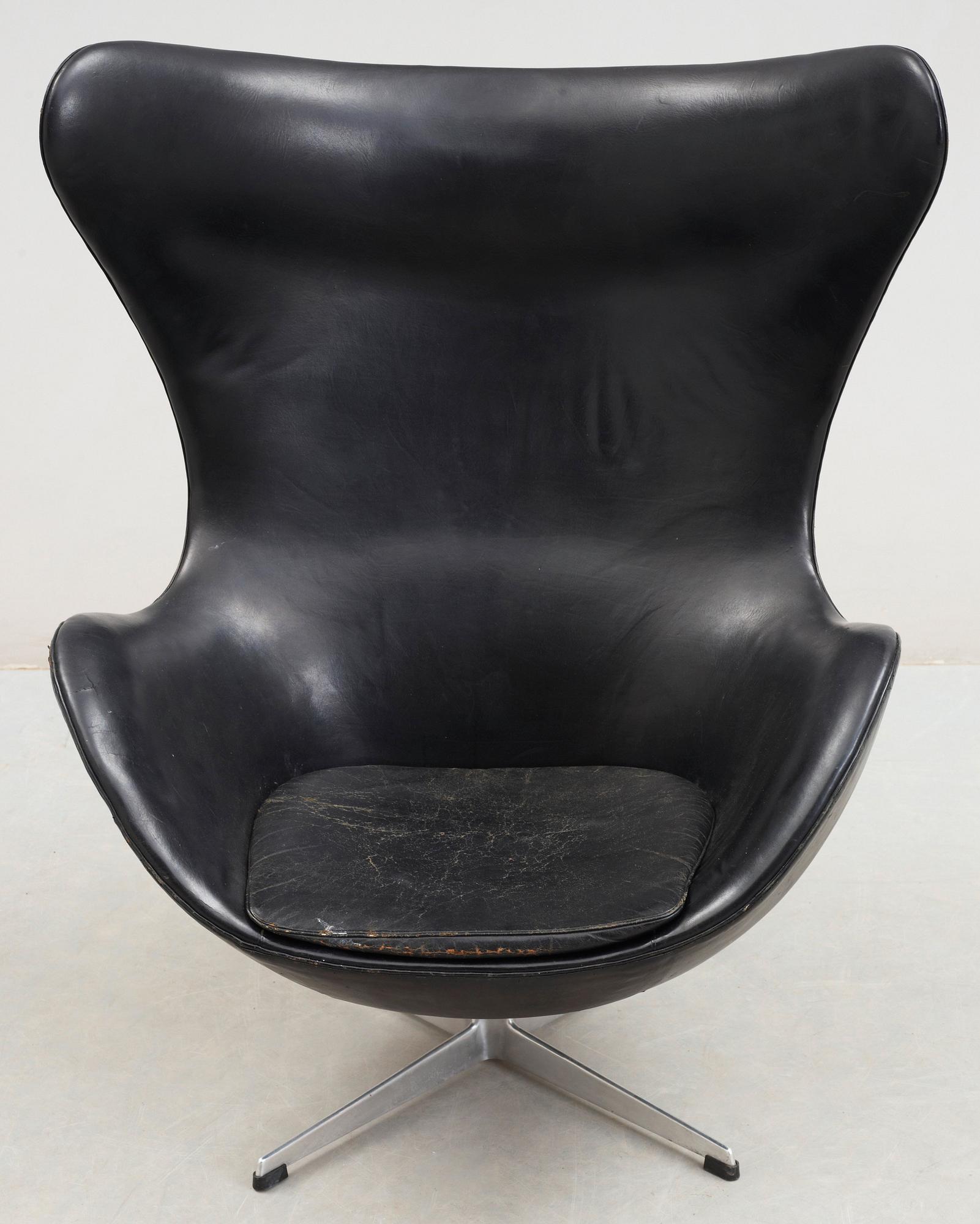 An Arne Jacobsen black leather 'Egg' chair, Fritz Hansen, Denmark 1960's.