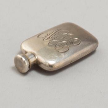 A TIFFANY & CO PERFUME BOTTLE, silver.