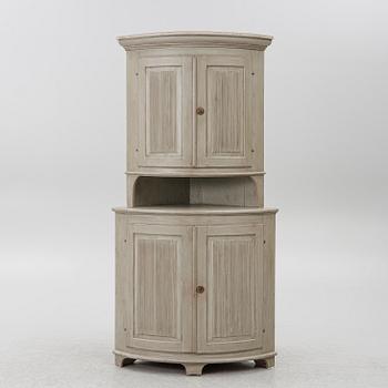 A Gustavian style corner cabinet, second half of the 20th Century.
