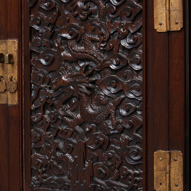 A pair of Chinese hardwood cupboards, late Qing dynasty (1644-1912).