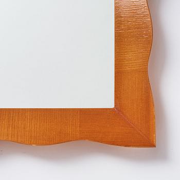 Swedish Modern, an elm framed mirror, Fröseke, 1940s-1950s.