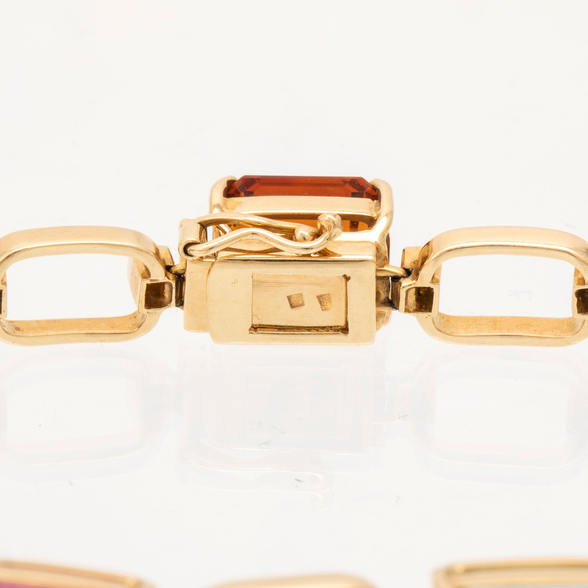 H Stern armband 18K guld och runda enkelslipade diamanter samt flertalet olika stenar.