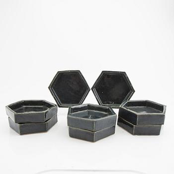 Signe Persson-Melin, a set of eight stonware plates.