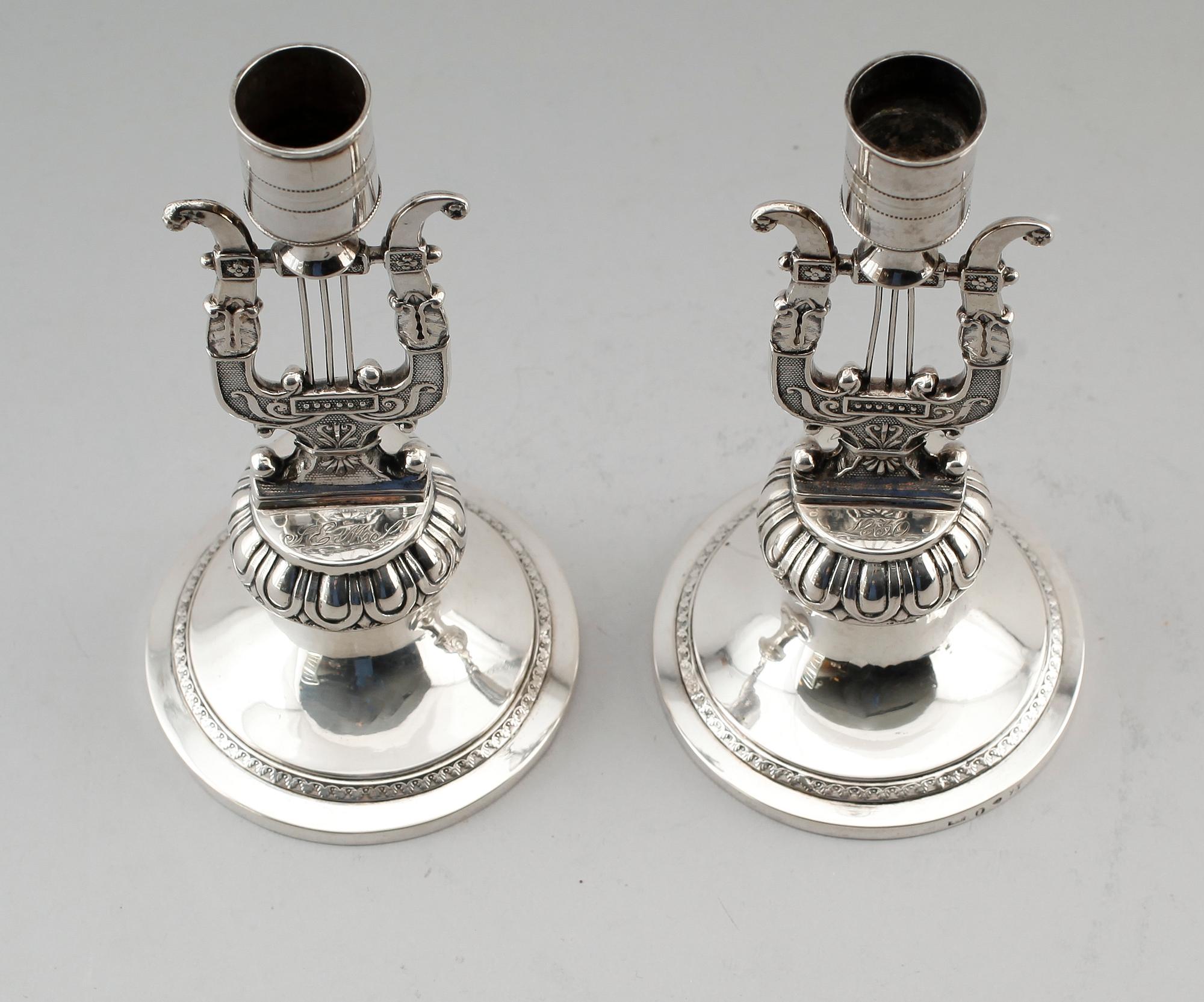 LJUSSTAKAR, 1 par, silver, Anders Lundqvist, Stockholm 1817 och 1829. Vikt ca 344 g.