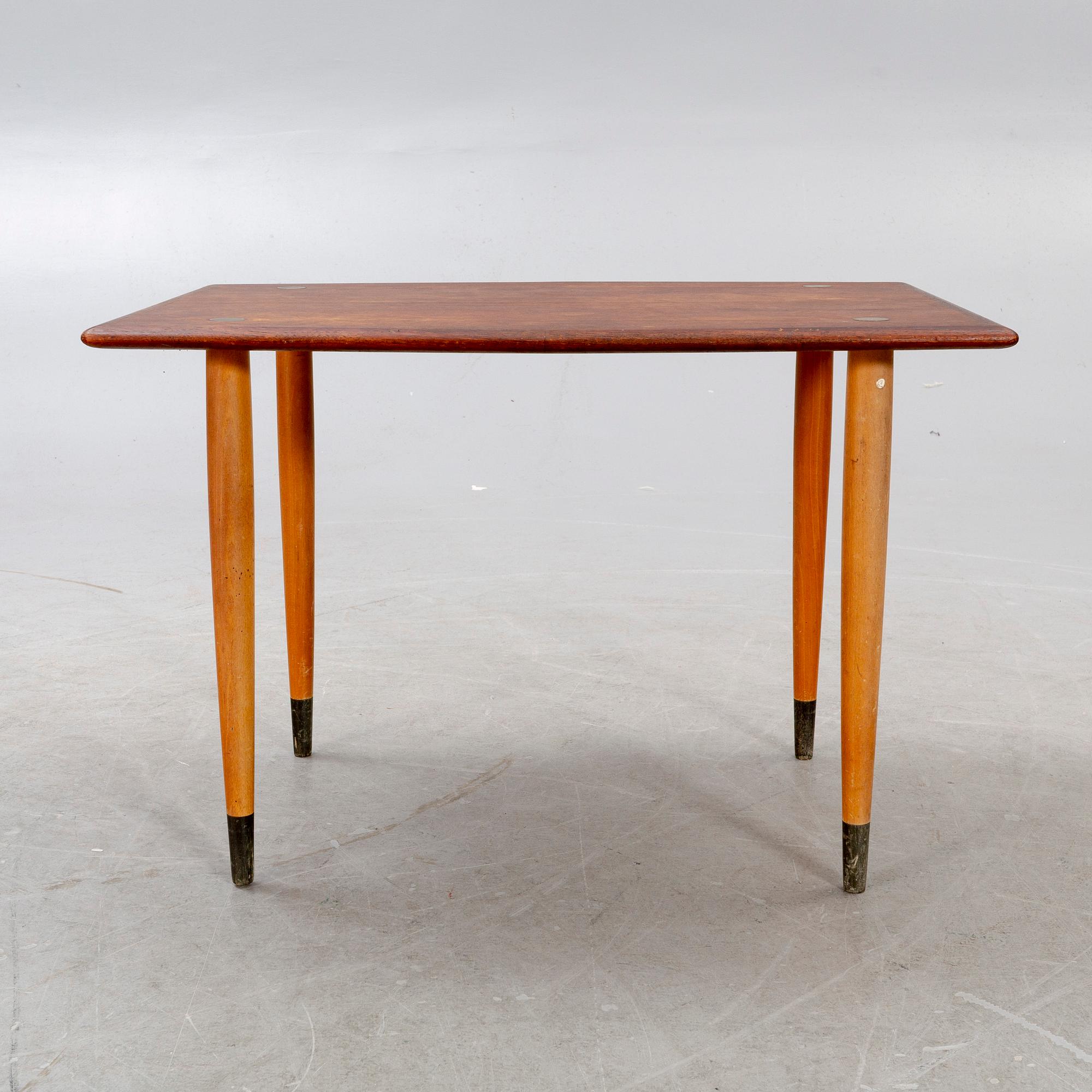 A mid 1900s teak coffee table from Tingströms möbler.