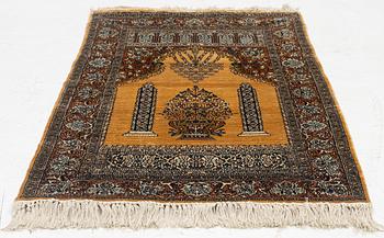 A silk Quum rug, c. 125 x 75 cm.