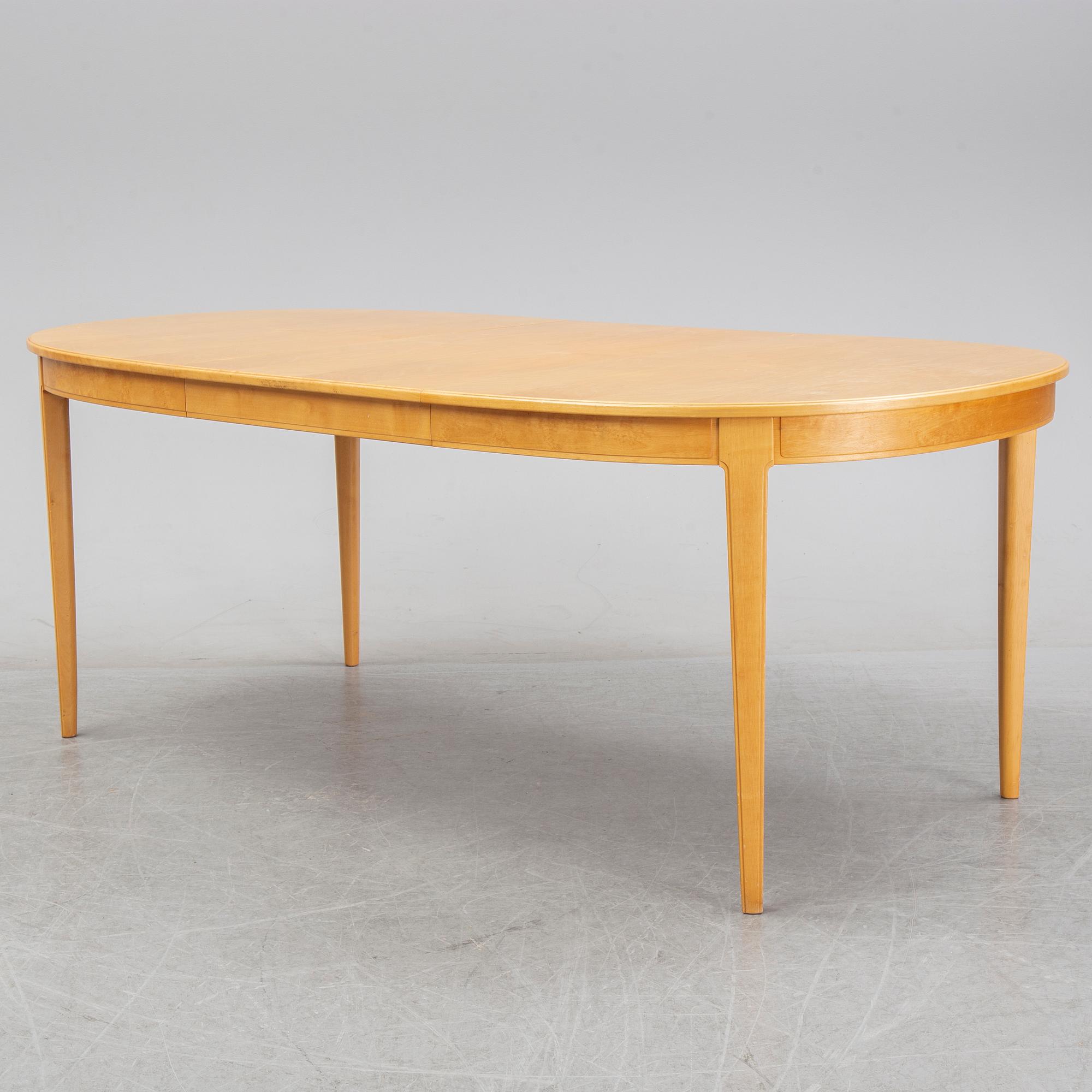 Carl Malmsten, a set of six 'Ambassadör' chairs and a 'Herrgården' dining table, second half of the 20th Century.