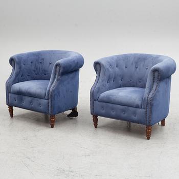 A pair of club armchairs, 21st century.