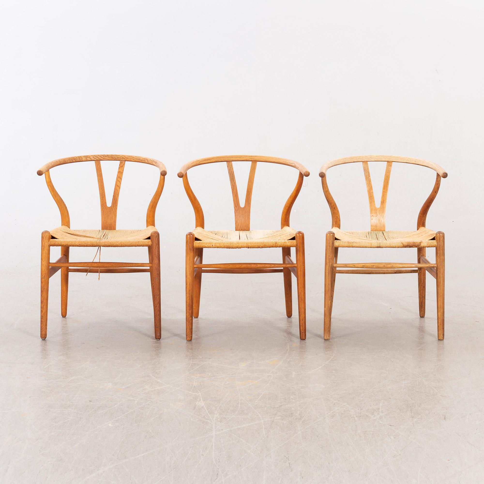Hans J Wegner, five CH 24 chairs  Carl Hansen & Son, Odense, Denmark.