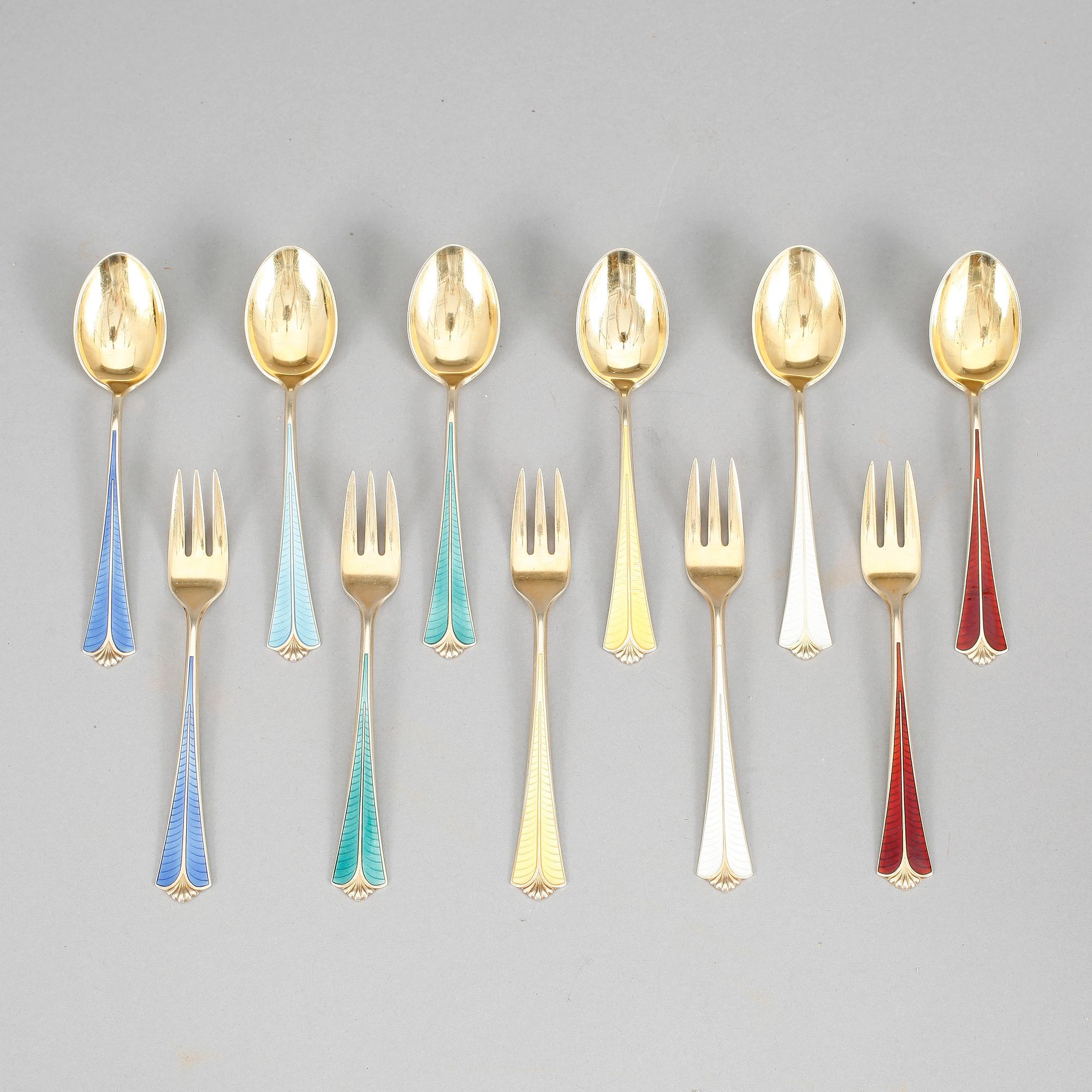 BESTICK, 11 st, förgyllt silver och emalj, David Andersen, Norge, 1900-tal. Vikt ca 267g.
