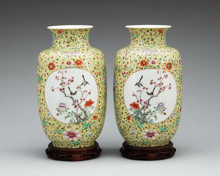 A pair of famille rose vases, presumably Republic, first half of 20th Century with Hongxians mark.