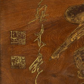 A Japanese carved and gilded wooden sign Edo-period (1603-1868).