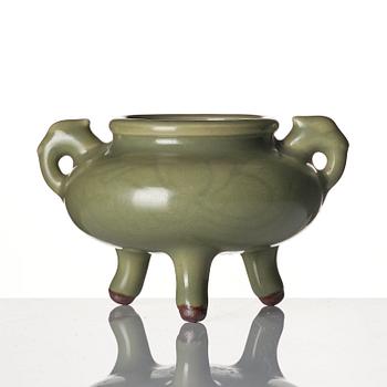 A celadon tripod brush-washer/censer, late Ming dynasty.