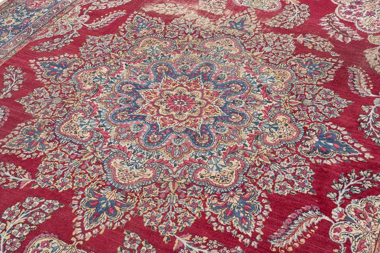 A semi-antique Kirman carpet, c. 366 x 270 cm.