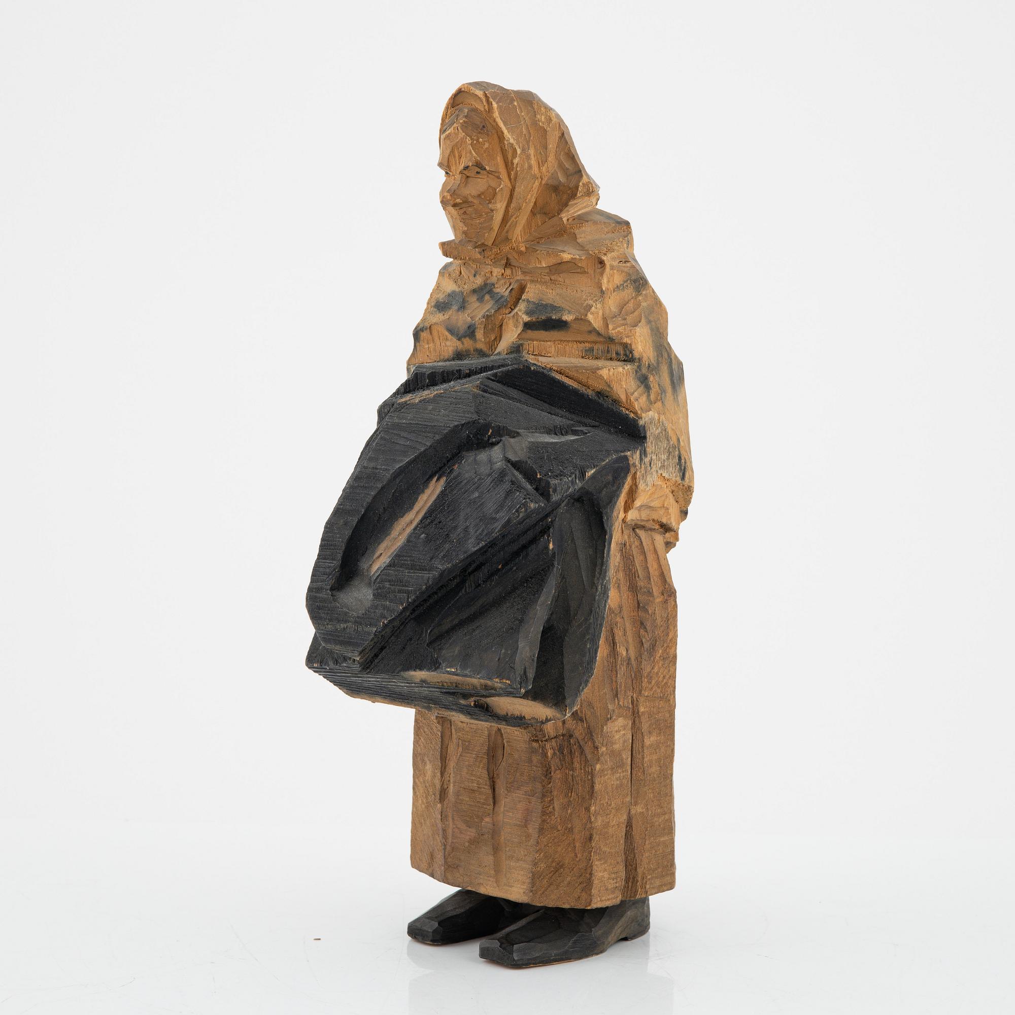 Axel Petersson Döderhultarn, skulptur, signerad. Delvis bemålat trä, höjd 25 cm.