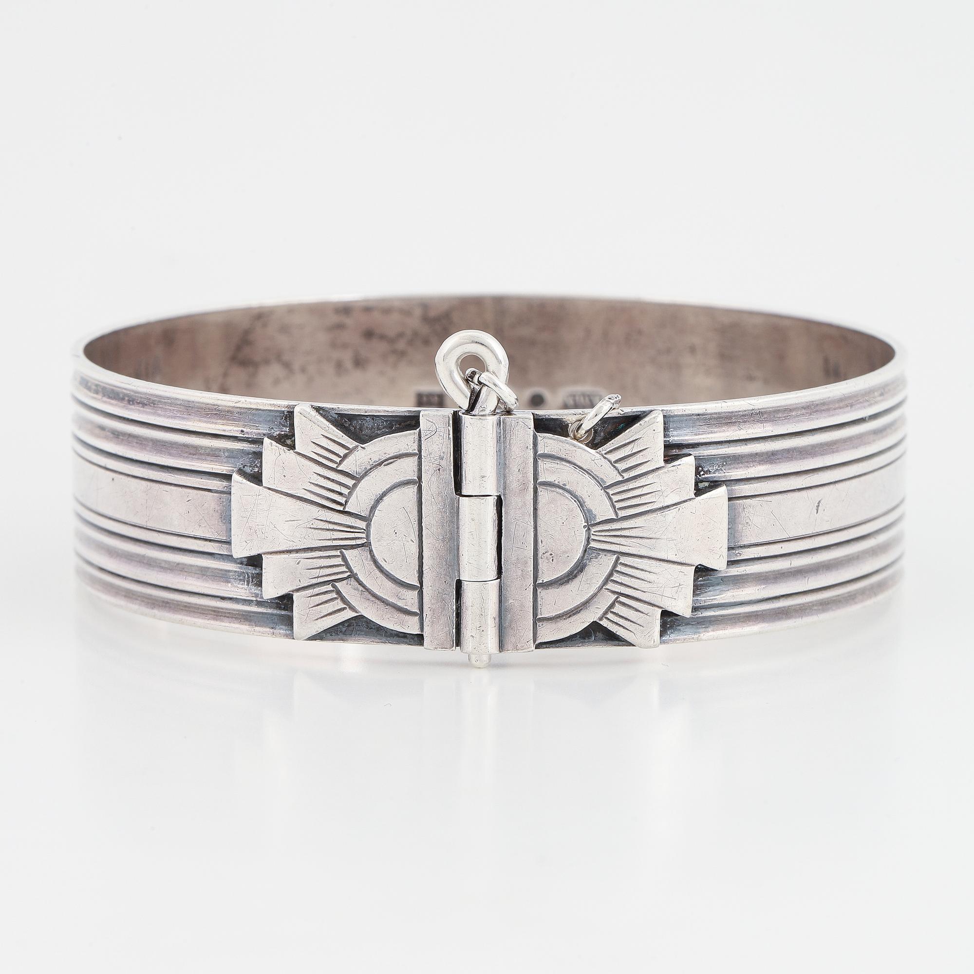 An Astrid Aagesen silver bangle.