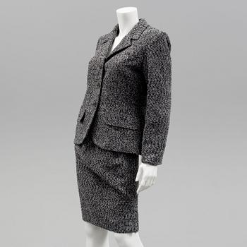 A womens two piece suit by Yves Saint Laurent.