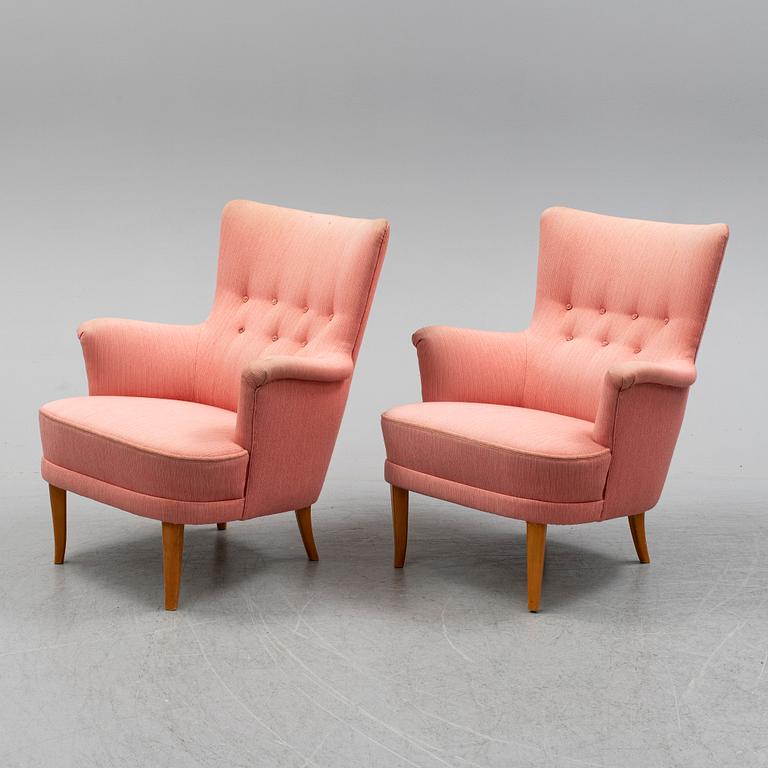 A pair of Carl Malmsten easy chairs.