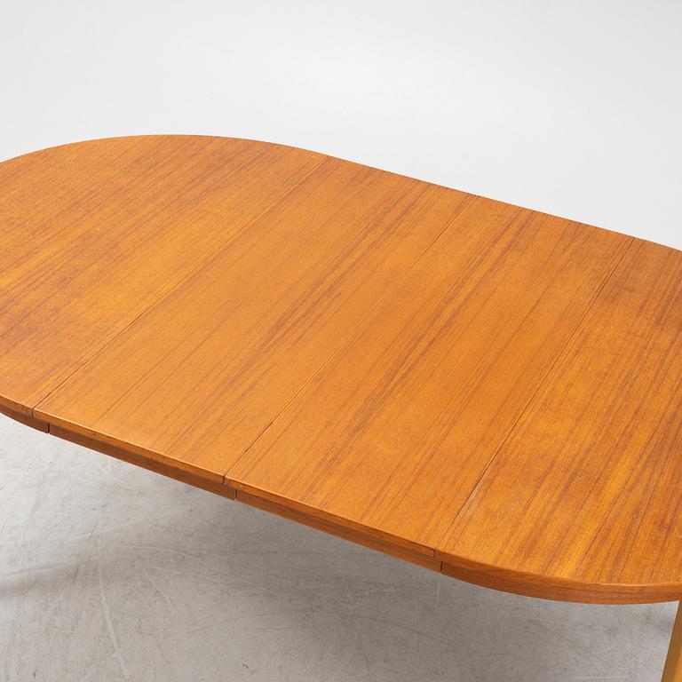 A teak veneered dining table, 1950's/60's.