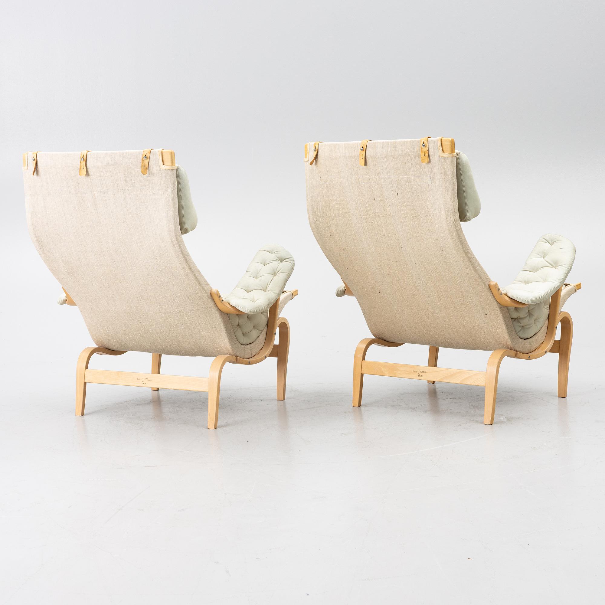 Bruno Mathsson, a pair of 'Pernilla' armchairs, Dux, Sweden, later part of the 20th century.
