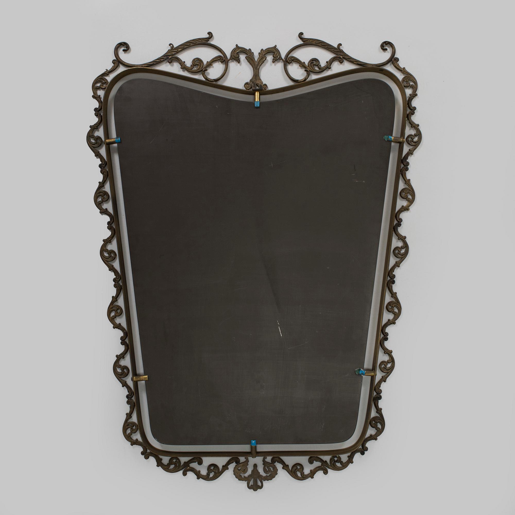 A 1950s/60s Italian brass mirror.