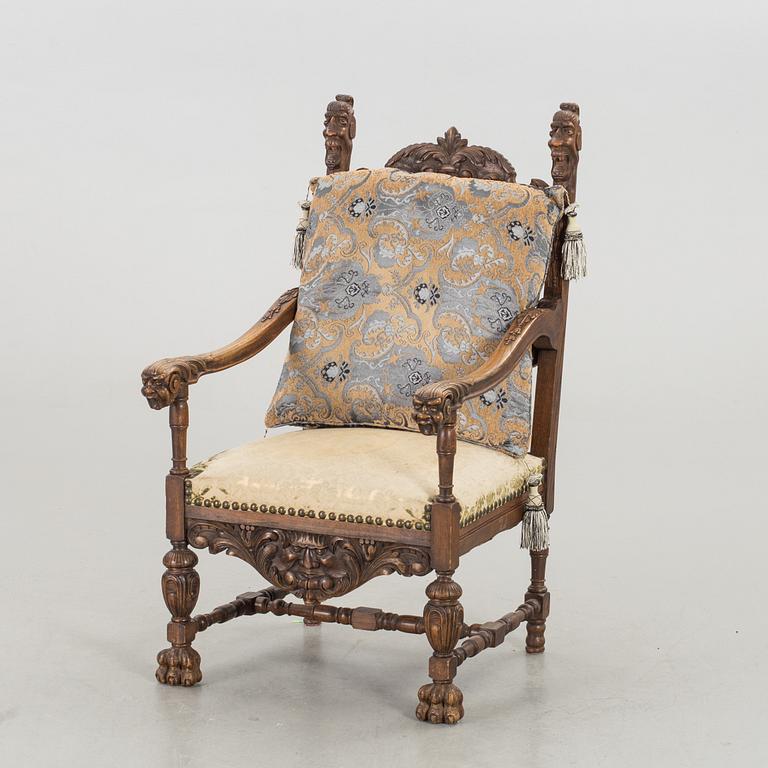 A BAROQUE STYLE ARMCHAIR CA 1900.