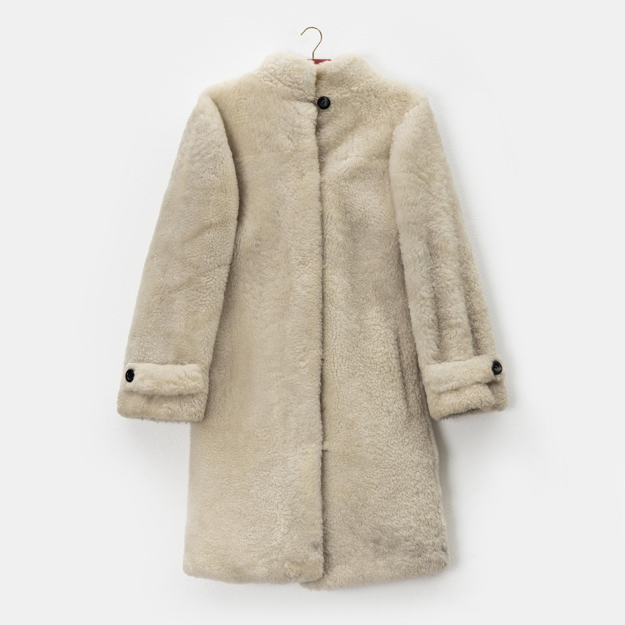 Yves Saint Laurent, kappa, storlek ca M.