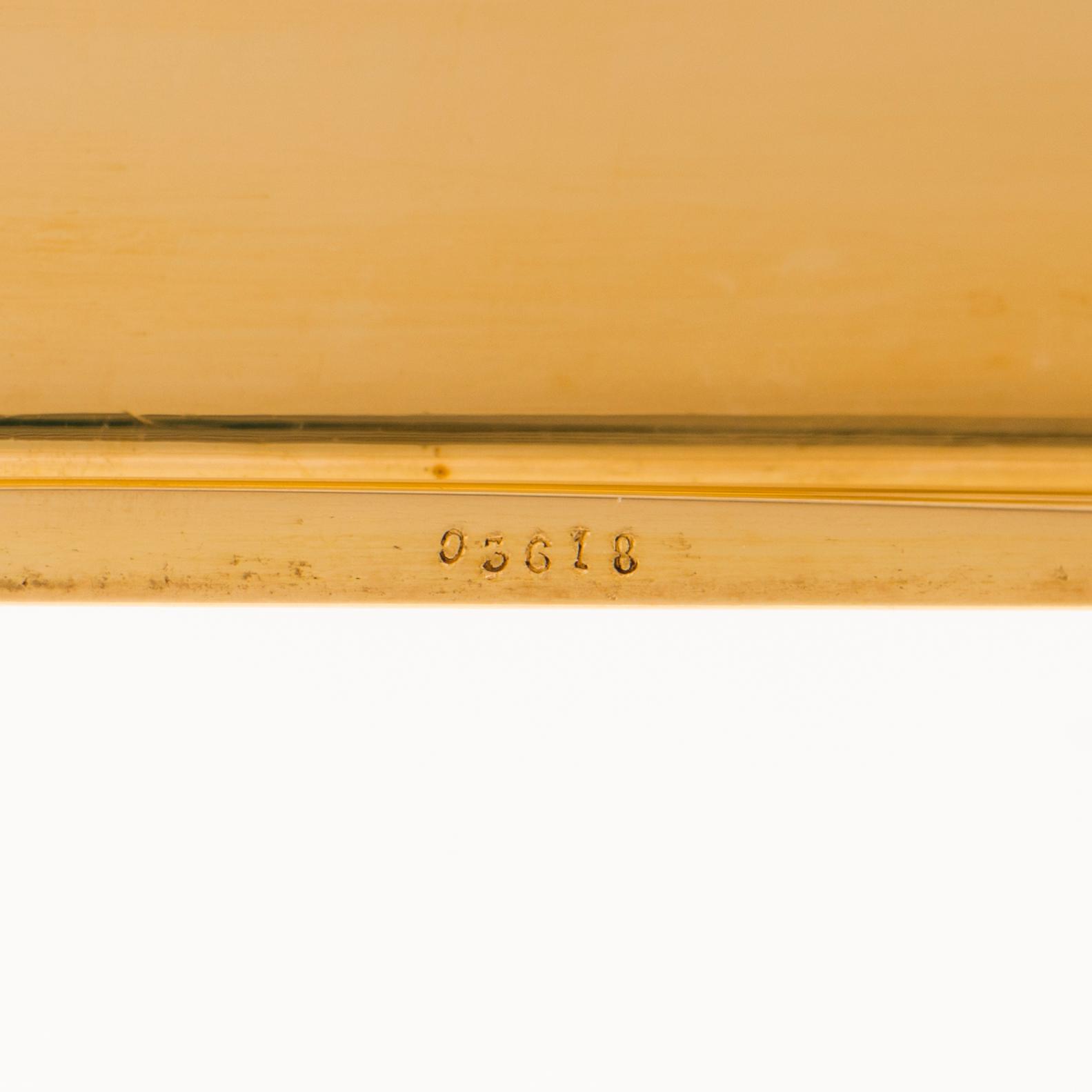 Cartier Art Deco cigarettetui 18K guld med svart emalj och safirer.