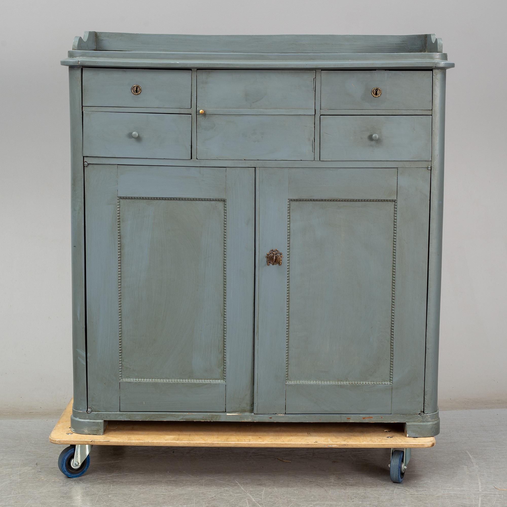 A mid 19th century painted cupboard.