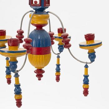 A pair of painted wood four-light chandeliers, second half of the 20th Century.