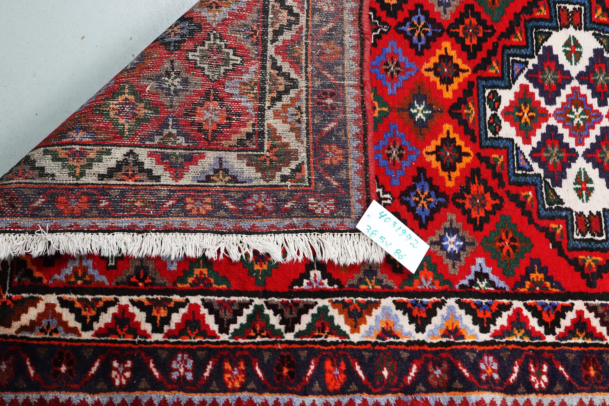 A runner carpet, Hamadan, c. 335 x 86 cm.