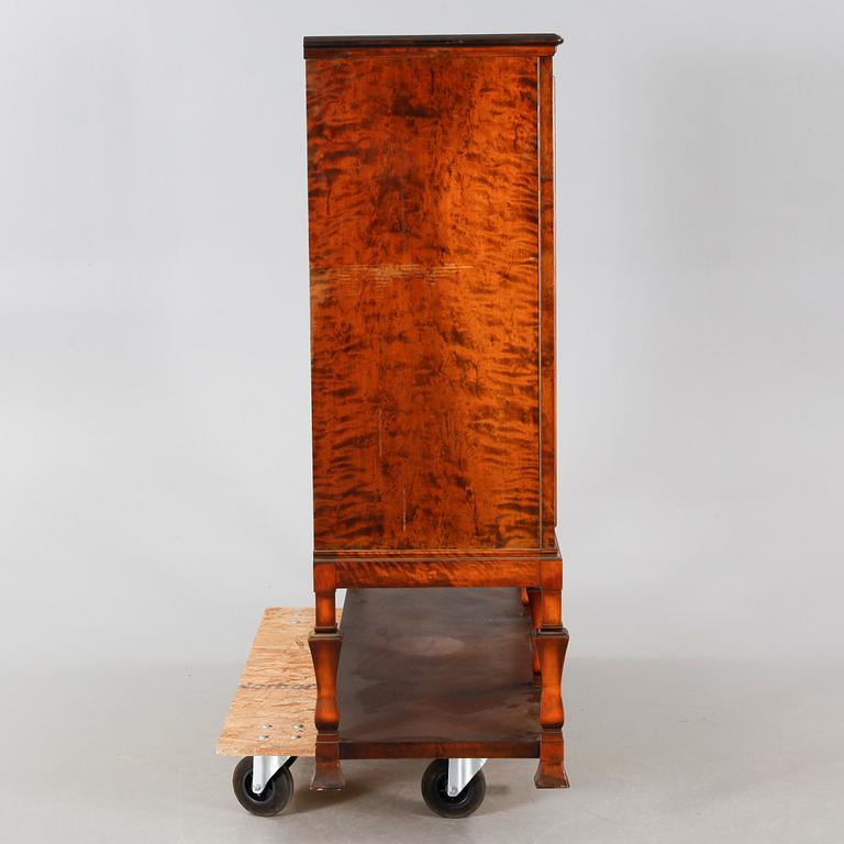 A 1920/30s swedish grace cupboard, model "Sture", made by AB Seffle Möbelfabrik.