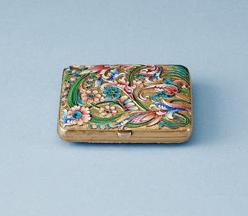 835. A Russian silver-gilt and enamel cigarette-case, makers mark of Nikolaj Swerew, Moscow 1896-1908.