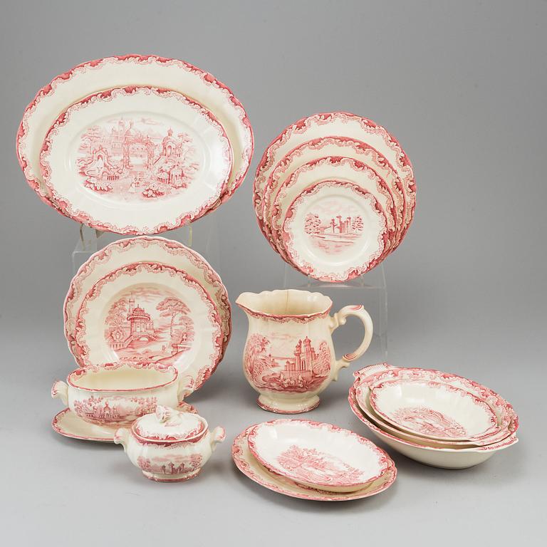 A part red 'Bengali' creamware dinner service, Rörstrand, 1948-56 (111 pieces).